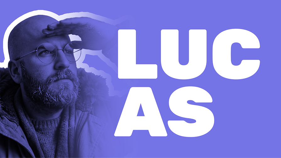 Cut-out portrait of Lucas in round glasses shielding his eyes with one hand beside his name set in large type.