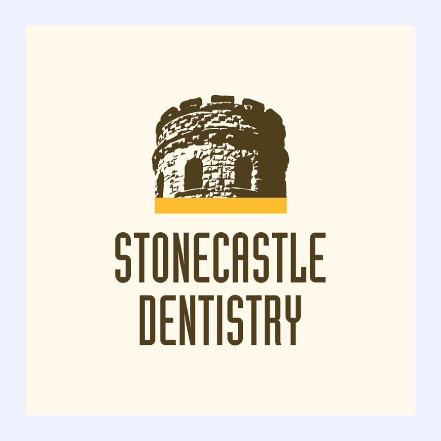 Logo of Stonecastle Dentistry featuring a stone castle tower above the company name.